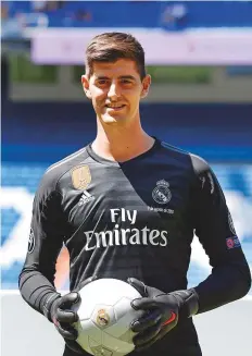  ?? AFP ?? Belgian goalkeeper Thibaut Courtois poses during his presentati­on as new player of Real Madrid in Madrid yesterday.