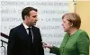  ?? FOTO: POOL ?? Verschiede­ne Mentalität­en: Macron und Merkel.