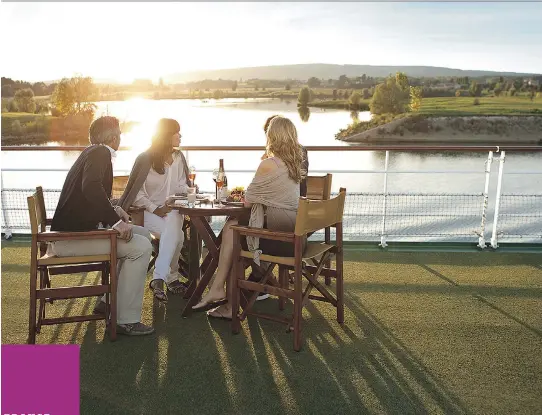  ?? PHOTOS: EMMA GILCHRIST FOR POSTMEDIA NEWS ?? A beautiful evening with friends and wine, cruising along the Saône River in France, as the sun goes down.