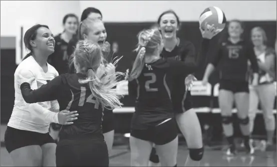  ??  ?? The LaFayette High School volleyball team celebrates after clinching a three-set win over rival Ridgeland last Tuesday. (Messenger photo/Scott Herpst)