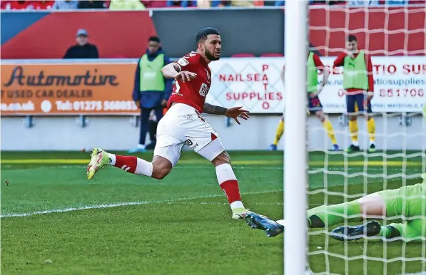  ?? ?? Nahki Wells gives Bristol City the lead in Saturday’s Championsh­ip game against West Brom at Ashton Gate