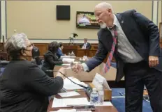  ?? Jacquelyn Martin/Associated Press ?? Texas state Rep. Senfronia Thompson, left, a Democrat, receives a fist bump from Rep. Chip Roy, R-Texas, at the start of a House Committee on Oversight and Reform hearing about voting rights in Texas on July 29 on Capitol Hill in Washington.
