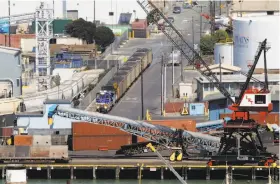  ?? Carlos Avila Gonzalez / The Chronicle 2015 ?? A train loaded with coal approaches the LevinRichm­ond Terminal in Richmond. A developer wants to use a waterfront facility in Oakland to store and ship coal and petroleum coke.