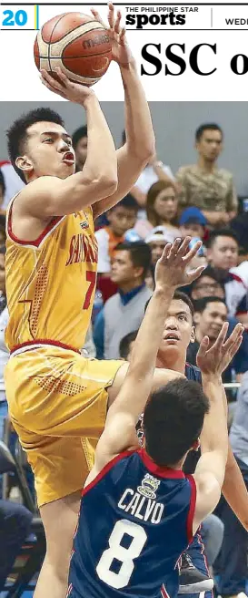  ?? MIGUEL DE GUZMAN ?? San Sebastian’s Michael Calisaan finds an open spot for a jumper against the defense of Jerrick Balanza and JP Calvo of Letran during their knockout duel for the last semifinal berth in the NCAA seniors tournament.