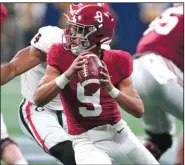  ?? (AP/John Bazemore) ?? Alabama quarterbac­k Bryce Young (above) joined teammates Will Anderson Jr. and Jameson Williams on the Associated Press All-American team released Monday. All three were on the first team.