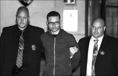  ??  ?? Frederick Then is walked from the 48th precinct to face charges related to the stabbing death of Junior Guzman-Feliz.(Photo: NY POST)