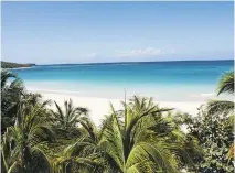  ??  ?? Flamenco Beach is a long crescent of white sand edged by turquoise water on Culebra, a sparsely populated cay off Puerto Rico’s east coast.