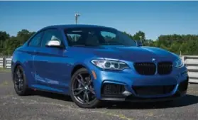  ?? BEN SANDERS/AUTOGUIDE.COM ?? The 2017 BMW M240i Coupe houses the smooth 35 hp, six-cylinder B58B30M0 engine.