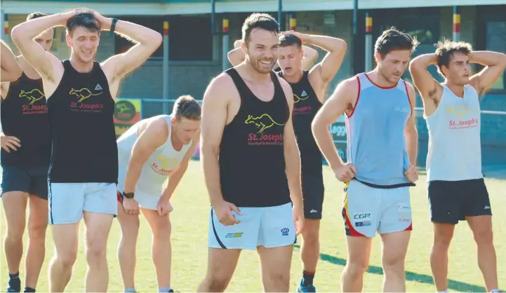  ?? Picture: MARK WILSON ?? NO HANGOVER: St Joseph's players have endured a tough pre-season training program to ensure they can defend their title this year.