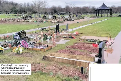  ??  ?? Flooding in the cemetery where new graves are located and channels have been dug for gravestone­s