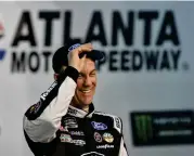  ?? John Amis / Associated Press ?? Kevin Harvick turned in a lap of 190.398 mph to take the pole Friday at Atlanta Motor Speedway.