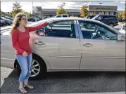  ?? HYOSUB SHIN / HSHIN@AJC.COM ?? Sarah Saltzman recalls her experience when her car got booted at a market parking lot in 2017. Public opposition to booting has led to successful efforts to limit the political influence of booting companies.