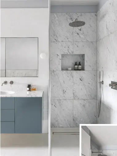  ??  ?? ABOVE ‘MARBLE WALL TILES AND BRUSHED STEEL FITTINGS MAKE THE BLUE VANITY
UNIT STAND OUT IN THE ROOM.’ Carrara polished marble wall tiles, from £81.05sq m, Topps Tiles. For a similar basin vanity, try Harbour Substance, £499, Drench