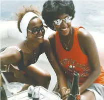 ?? ROBYN CRaWFORD ?? Whitney Houston, left, and Robyn Crawford, seen in Australia in 1987, met as teenagers and were best friends. Crawford offers insights into the late singer’s life in the new memoir A Song for You.