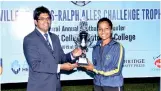  ??  ?? Visakha Vidyalaya skipper receiving the trophy