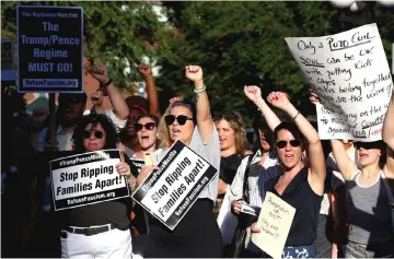  ??  ?? People protest against the Trump administra­tion policy of separating immigrant families suspected of illegal entry, in New York. — Reuters photos