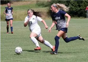  ?? The Sentinel-Record/Richard Rasmussen ?? ■ National Park’s Aleandra Clark (19), left, and Rose State’s Keanna Witte (2) chase the ball during NPC’s 8-0 loss Thursday.