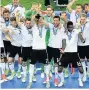  ??  ?? CHAMPIONS Germany celebrate with trophy