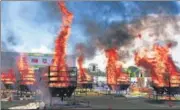  ?? ANI ?? Forest department officials burn Rhino horns at Bokakhat stadium in Golaghat on Wednesday.