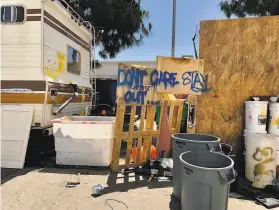  ?? Yalonda M. James / The Chronicle ?? A homeless RV camp on a street near a Home Depot at 4000 Alameda Ave. in Oakland is blamed for a rise in crime and safety concerns around the store.