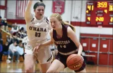  ?? PETE BANNAN - DAILY LOCAL NEWS ?? Conestoga‘s Maggie Neary tries to move the ball as O’Hara’s Bridget Dawson defends in the first quarter of the PIAA Class 6A opening round contest at Archbishop Carroll High School on Friday.