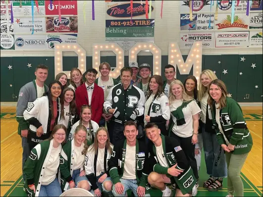  ?? Photo courtesy of Melissa Majchrzak ?? Kevin Bacon visits Payson High School, a filming location for the movie “Footloose,” on April 20.