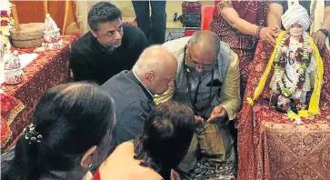  ??  ?? ’UNAFFECTED’: Shrien Dewani, pictured here at a Bristol temple, has shrugged off Anni’s death, says her father, Vinod Hindocha