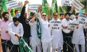  ?? ?? MEMBERS of the Peoples Democratic Party stage a protest in Jammu in response to a call for Jammu Bandh.
DYING INDUSTRIES