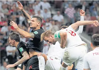  ??  ?? Croatia defender Dejan Lovren, second left, in action in the World Cup semi-final against England.