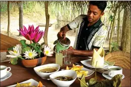  ??  ?? Preparing food at The Mudhouse. Right: A Sri Lankan leopard AUTHENTIC: