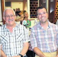  ??  ?? Ds Charle Rossouw and Stefan Malan enjoying the country dance on Friday evening