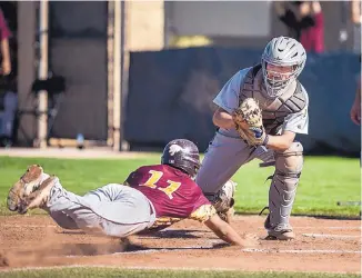  ?? ROBERTO E. ROSALES/JOURNAL ?? St. Pius catcher Josh Lackner prepares to tag out Belen’s Tim Sedillo at the plate during the Sartans’ 5-0 win Friday.