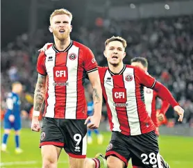  ?? ?? Setbacks that changed mood: Declan Rice (left) scores Arsenal’s sixth at the London Stadium on Sunday;
Oli Mcburnie (above) seals a draw for Sheffield United with a penalty deep into added time; Tommy Conway’s goal after just three minutes (right) was enough for Bristol City to knock West Ham out of the FA Cup third round in a replay