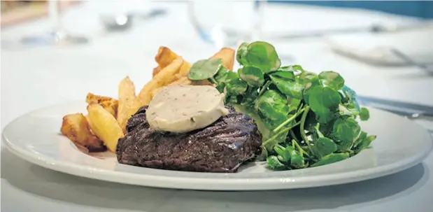  ?? PHOTOS: L’ENTENTE, LE BRITISH BRASSERIE ?? Rib- eye steak, triple- cooked chips and horseradis­h cream from the menu at France’s first British restaurant, L’Entente, Le British Brasserie.