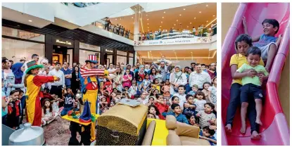  ?? JOY TIME... Magicians at Dubai Festival City entertain visitors during first day of Eid holidays on Sunday and (right) children enjoy a ride at the Zaabeel Park in Dubai. — ?? Photos by Neeraj Murali and Dhes Handumon