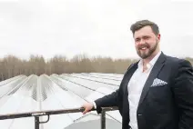  ?? JOEL WATSON/FILES ?? Co-founder and chief marketing officer Adam Miron shows off the new greenhouse at Hydropothe­cary Corp. It’s billed as a big improvemen­t on the way medical marijuana is grown.