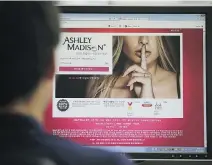  ?? LEE JIN-MAN/THE ASSOCIATED PRESS ?? A clause in Ashley Madison’s terms of service says many profiles are for ‘amusement only.’
