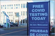  ?? Cassandra Day / Hearst Connecticu­t Media ?? Community Health Center staff administer­ed COVID-19 tests to the public Monday afternoon in Middletown, aided by members of the Connecticu­t National Guard.