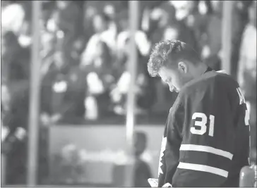  ?? THE CANADIAN PRESS/FRANK GUNN ?? Toronto Maple Leafs goaltender Frederik Andersen (31) looks down as players and fans stand for a moment of silence after nine people died and 16 others were injured when a van mounted a sidewalk and struck multiple pedestrian­s along a stretch of one of...