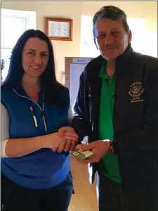  ??  ?? MacBride Pitch & Putt Club’s Audrey Donnelly pictured receiving the Ladies Scratch Cup runner-up prize from Lough Owel chairman Davy Corcoran.