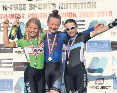  ??  ?? Topping the podium Erin Boothman (centre) enjoyed a series of medal wins for EK Road Club in recent weeks