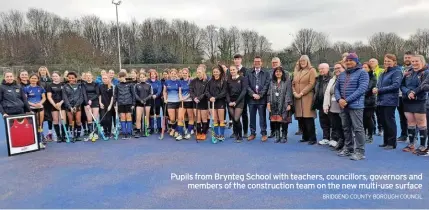  ?? BRIDGEND COUNTY BOROUGH COUNCIL ?? Pupils from Brynteg School with teachers, councillor­s, governors and members of the constructi­on team on the new multi-use surface