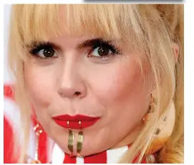  ?? ?? She’s hooked: Paloma Faith was ahead of the trend when she wore this fish hook-style decoration to the Q Awards pre-pandemic, but it didn’t win many fans