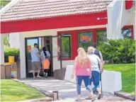  ?? EDDIE MOORE/JOURNAL ?? Customers head toward a Weck’s in Santa Fe on Monday. The restaurant remained open to in-person dining despite a recent public health order.