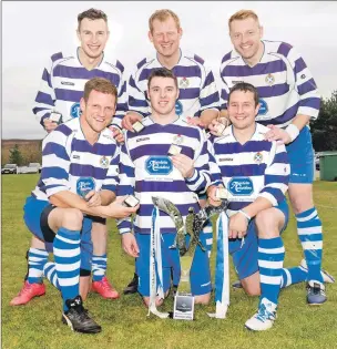  ??  ?? Newtonmore won their seventh championsh­ip in a row this year and pictured are the six players who have picked up all seven winners’ medals. Back: Andy MacKintosh, Jamie Robinson and Paul MacArthur. Front: Norman Campbell, Steven MacDonald and Glen...