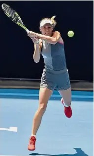  ??  ?? Back to you: Denmark’s Caroline Wozniacki returns a shot during a training session ahead of the Australian Open in Melbourne yesterday.