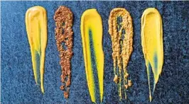  ?? SCOTT SUCHMAN FOR THE WASHINGTON POST ?? Styles of mustards include (from left) honey, whole grain, yellow, deli and Dijon.