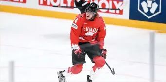  ?? PHOTO AFP ?? Maxime Comtois célèbre après avoir marqué un but important face à la Finlande.