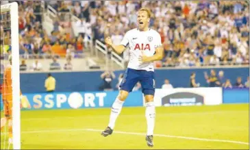  ?? ALEX MENENDEZ/GETTY IMAGES/AFP ?? Tottenham Hotspur striker Harry Kane celebrates after scoring a penalty in the Internatio­nal Champions Cup 2017 match against Paris Saint-Germain in Orlando, Florida on Saturday.