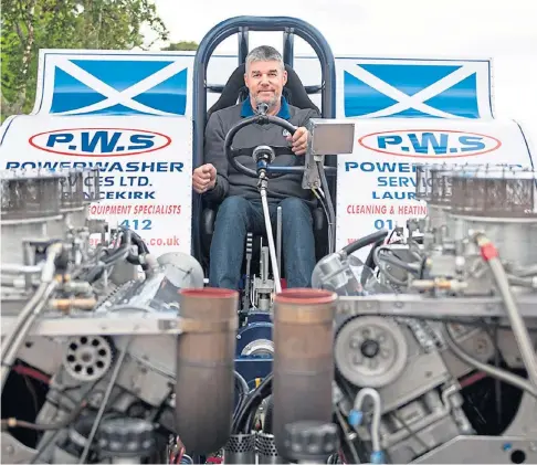  ??  ?? BIG BEAST: Jim Whitecross takes the seat of his 2,500-horsepower machine Gator; below, the vehicle on display.